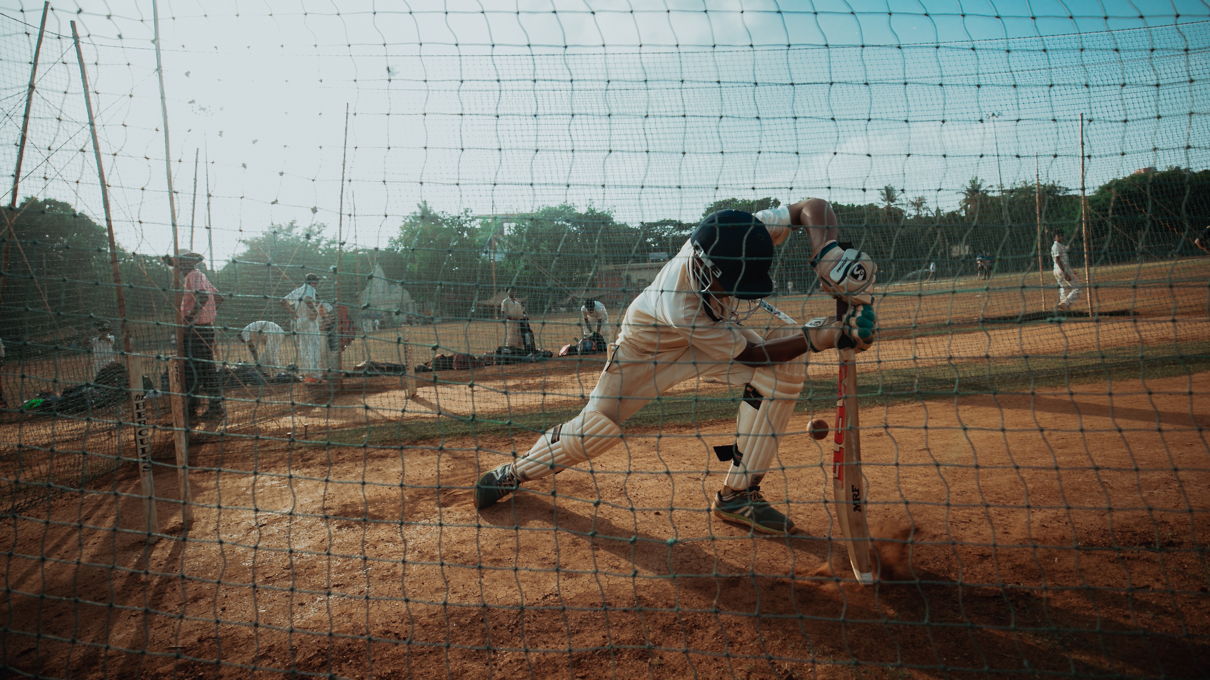 Cricket action at Surbiton Sports Club